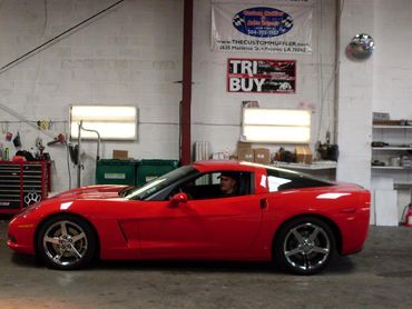 Red car in in a workshop