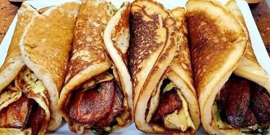 Pancake wrapped bacon and eggs.