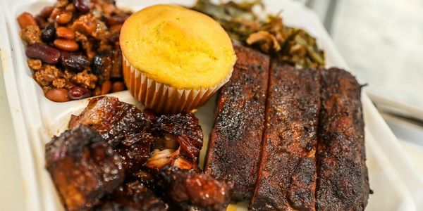 2 MEAT PLATE WITH BURNT ENDS RIBS COWBOY BEANS COLLARD GREENS AND CORN BREAD