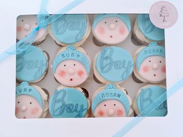Baby shower cupcakes topped with fondant topper and personalised 
Girl or boy or both  
Set of 12 £4