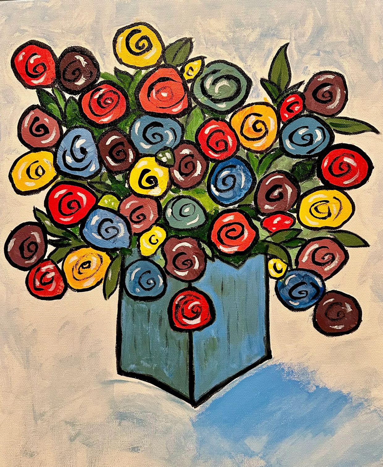 Multiple colored abstract flowers in square vase