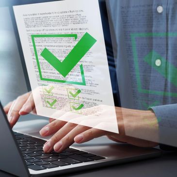 Person typing on laptop with virtual checklist and green check marks overlay.