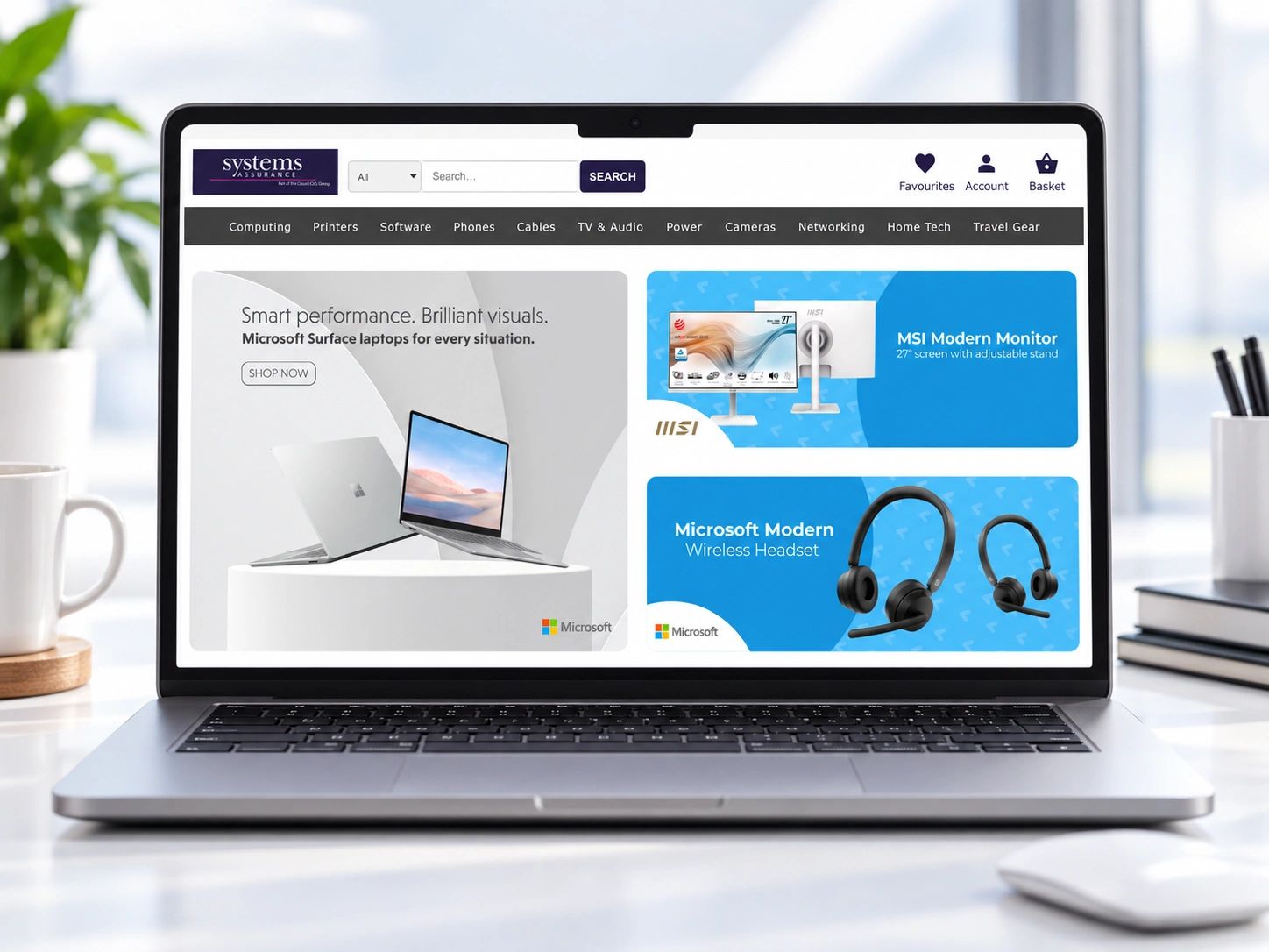 Laptop displaying the actual Systems Assurance WebStore homepage.