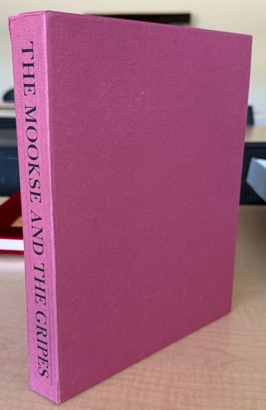 A pink book with the title 'The Mookse and The Grips' on its spine.