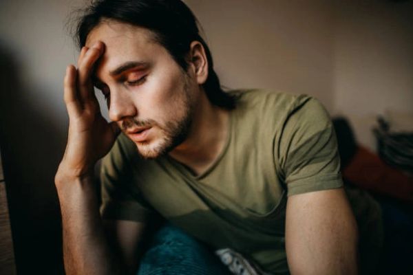Man dealing with anger, frustration and feeling miserable