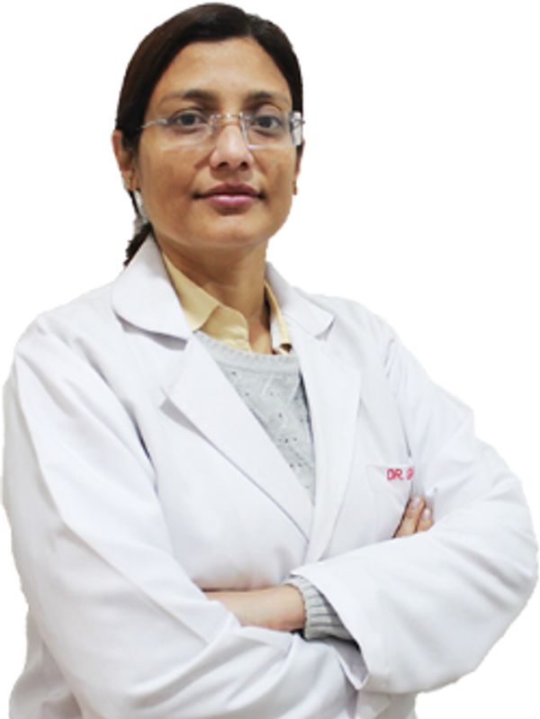 Confident female doctor in a white coat with arms crossed.