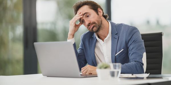 busy businessman on laptop