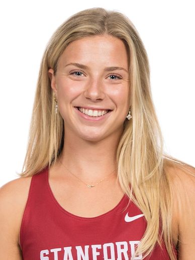Smiling young woman in Stanford athletic top.