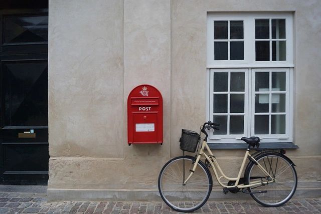 Bicycle next to postal box