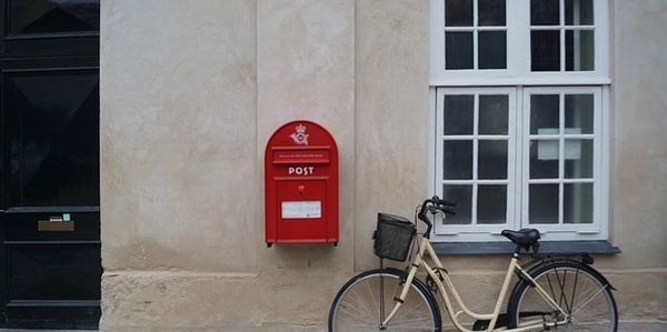 Bicycle next to postal box