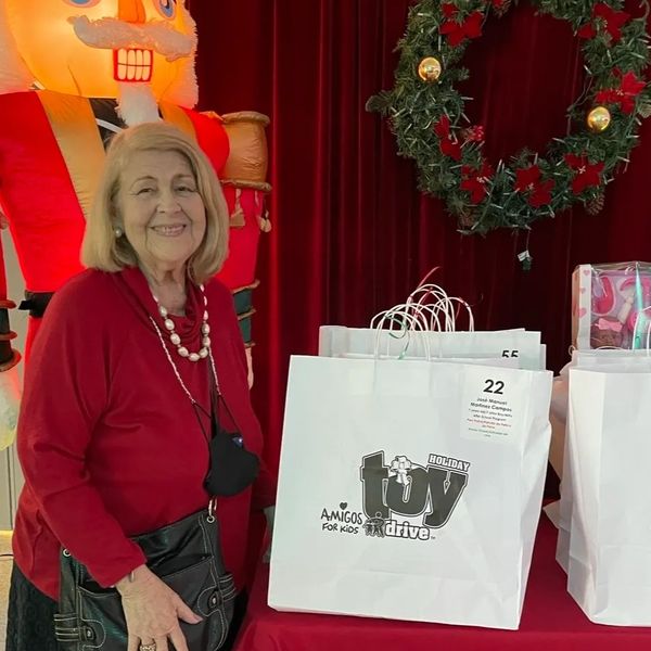 Gilda M. Plasencia at one of her favorite annual holiday traditions, the Amigos For Kids' Toy Drive.