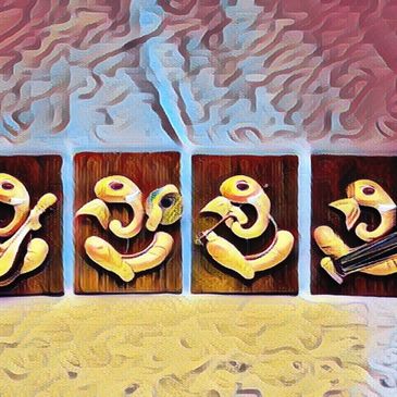 Four artistic golden bird sculptures on wooden plaques.