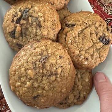 A plate of homemade oatmeal raisin cookies.