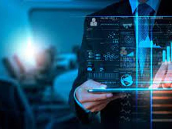 Businessman using futuristic digital tablet with data analytics.