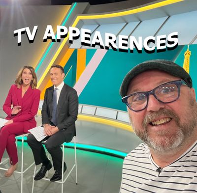 Man taking selfie with TV hosts and 'TV Appearances' text.