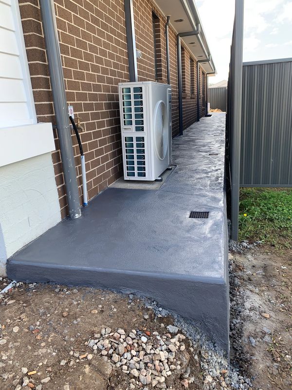 New coloured footpath with side entrance steps and new drainage collars along path, solve that water