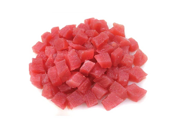 Fresh diced raw tuna pieces on a white background.