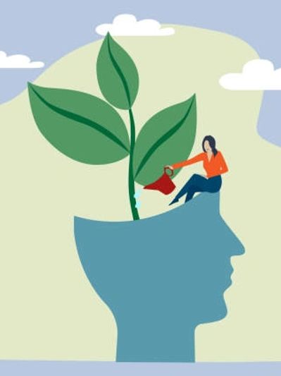 Person watering a plant growing from a head silhouette, symbolizing growth.