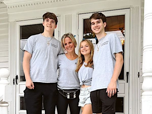 A Group of People Standing in Front of a Door