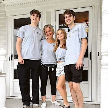 A Group of People Standing in Front of a Door