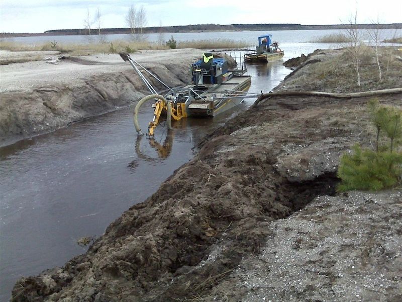 silt removal from channel, canals