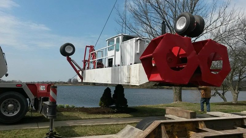 Lake Dredging contractor dredging in hard to reach areas