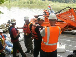 Aquatic Weed harvesting in MI emergency clean up