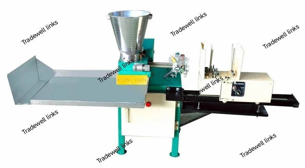 Automatic sausage stuffer and linker machine for efficient meat processing.