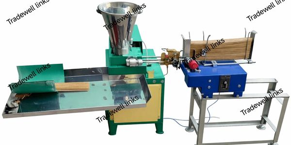 Industrial machine producing wooden sticks efficiently.