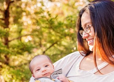 Mothers hold their children's hands for a while, but their hearts forever