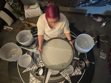 Photo of Rachel Nelson playing an Ocean Wave Drum taken from above