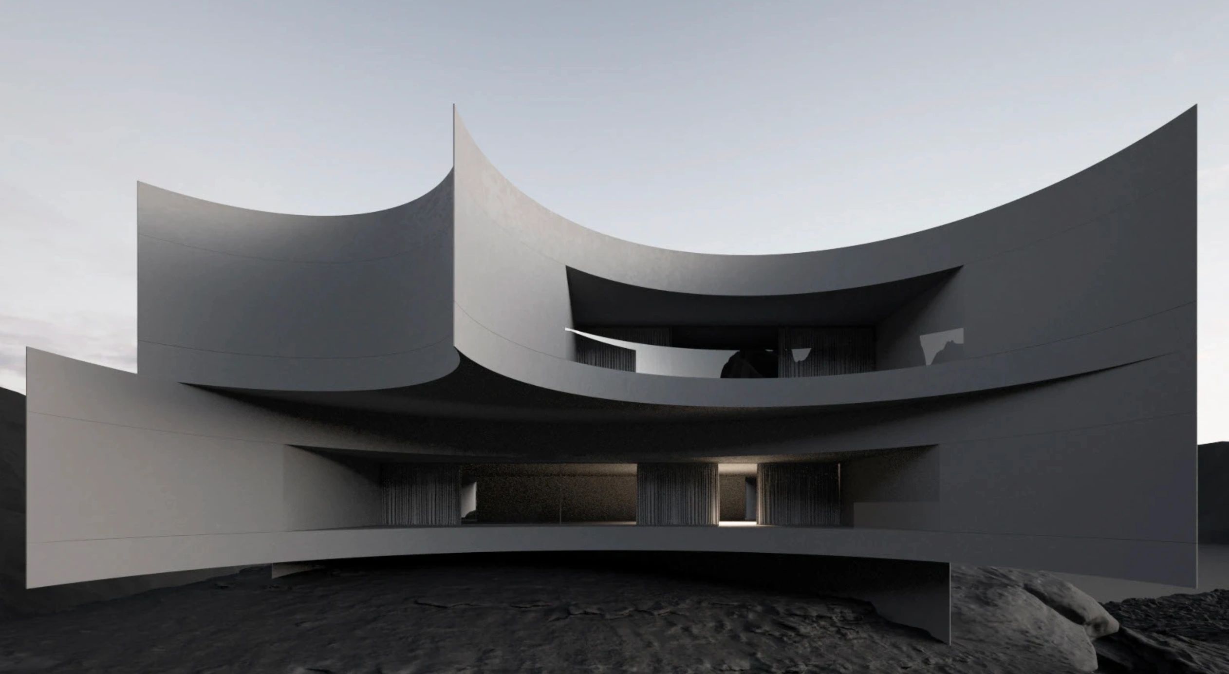 Modern architectural structure with curved concrete walls and open spaces.