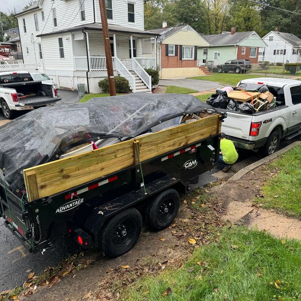 Dump trailer used for junk removal services during a home and garage clean-out in Maryland