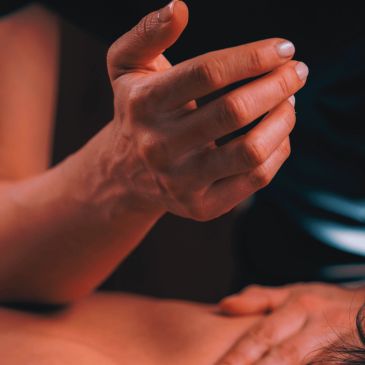Massage therapist working.