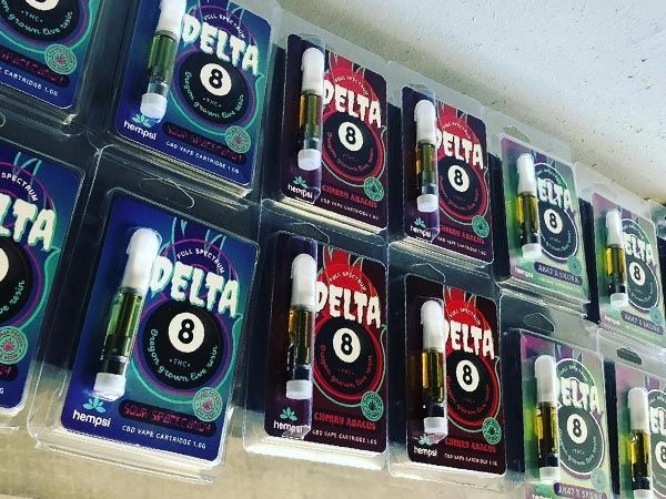 Delta 8 vape product hanging on the wall