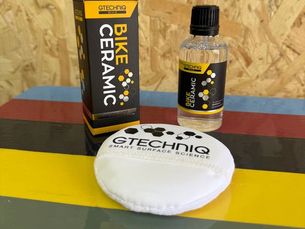 Gtechniq Bike Ceramic coating kit with bottle and applicator pad.