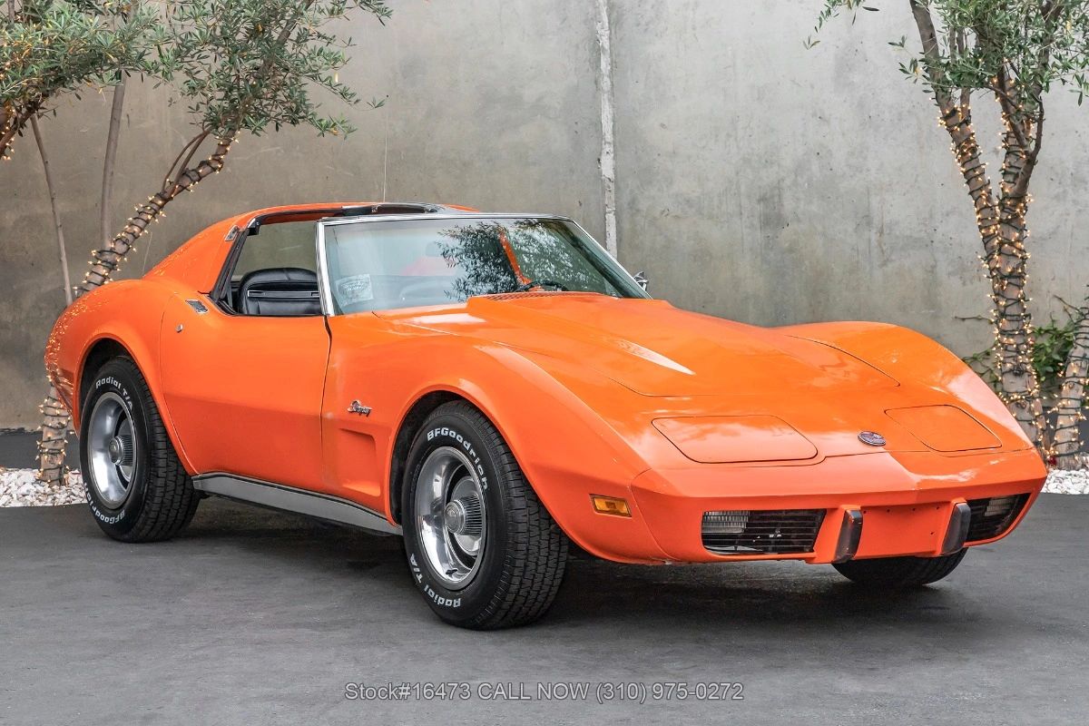 The 1975 Corvette arrived at a turning point, and this Orange Flame (Code 70) T-top coupe captures that moment perfectly. With its long, sculpted C3 bodywork and removable roof panels, it still delivered the presence and drama buyers expected from America’s sports car—even as the era around it was changing. This was a Corvette shaped as much by adaptation as ambition, balancing style, comfort, and identity in a decade defined by transition. It’s the ideal starting point for understanding what 1975 was really about—and why the story deserves a closer look.