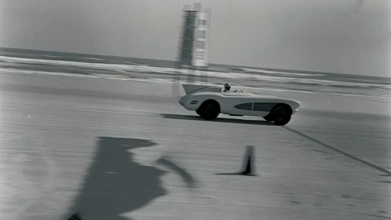 aptured during February 1956 speed testing at Daytona Beach, this image shows the EX-87 pushed hard across the hard-packed sand in pursuit of absolute top-speed data. Following its Arizona successes, the car was brought to Daytona to validate high-speed stability and power delivery in a radically different environment, where surface conditions and crosswinds posed new challenges. The testing reinforced the gains made through Duntov’s engine and aerodynamic refinements, confirming that the Corvette’s performance advances were repeatable—not isolated to a single proving ground. At Daytona, the EX-87 continued its role as proof, not prototype, demonstrating that Chevrolet’s sports car could sustain serious speed wherever it was tested.