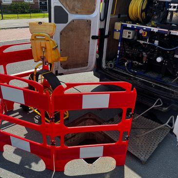 Red safety barriers and equipment in a vehicle.