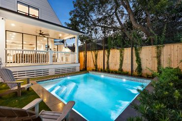 a small size swimming pool and chairs 