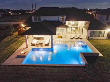 A view of a pool at night