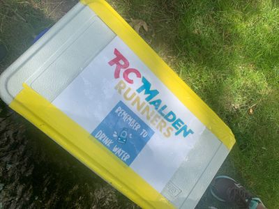 An RCMalden cooler full of water for runners