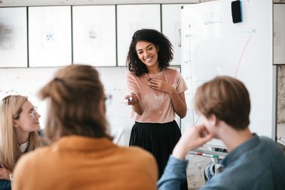 A speaker engaging with her audience