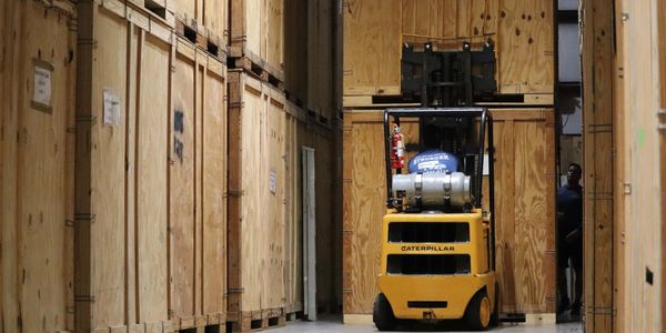 secure storage warehouse with forklift