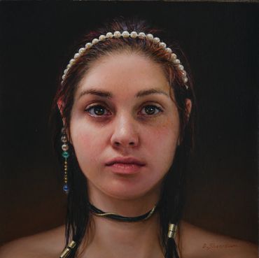 Portrait of a young woman with a pearl headband and single dangling earring.