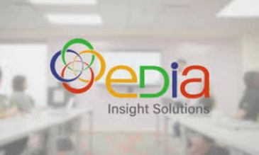 Logo of eDia Insight Solutions in a modern office setting.