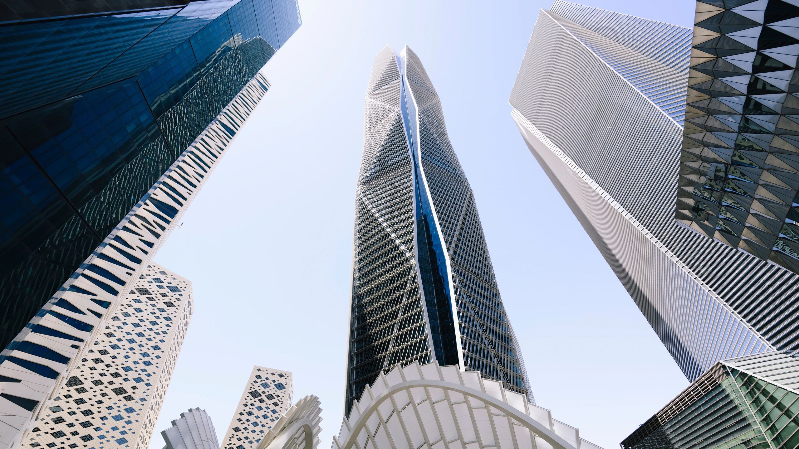 High-rise corporate buildings against a clear sky; symbol of professional reach of BPO consulting