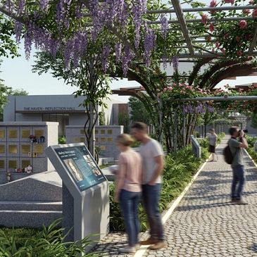 People exploring a serene garden with blooming flowers and informational plaques.