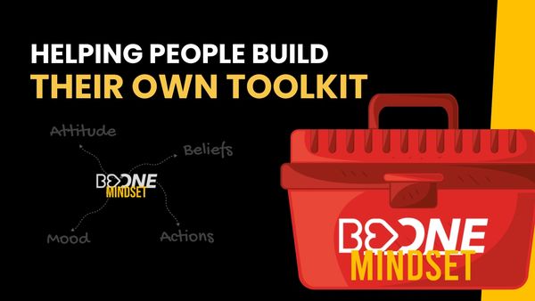 Red toolbox with 'Boone Mindset' helping people build their own toolkit.