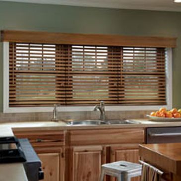 Newly applied custom blinds in a kitchen in Englewood, FL